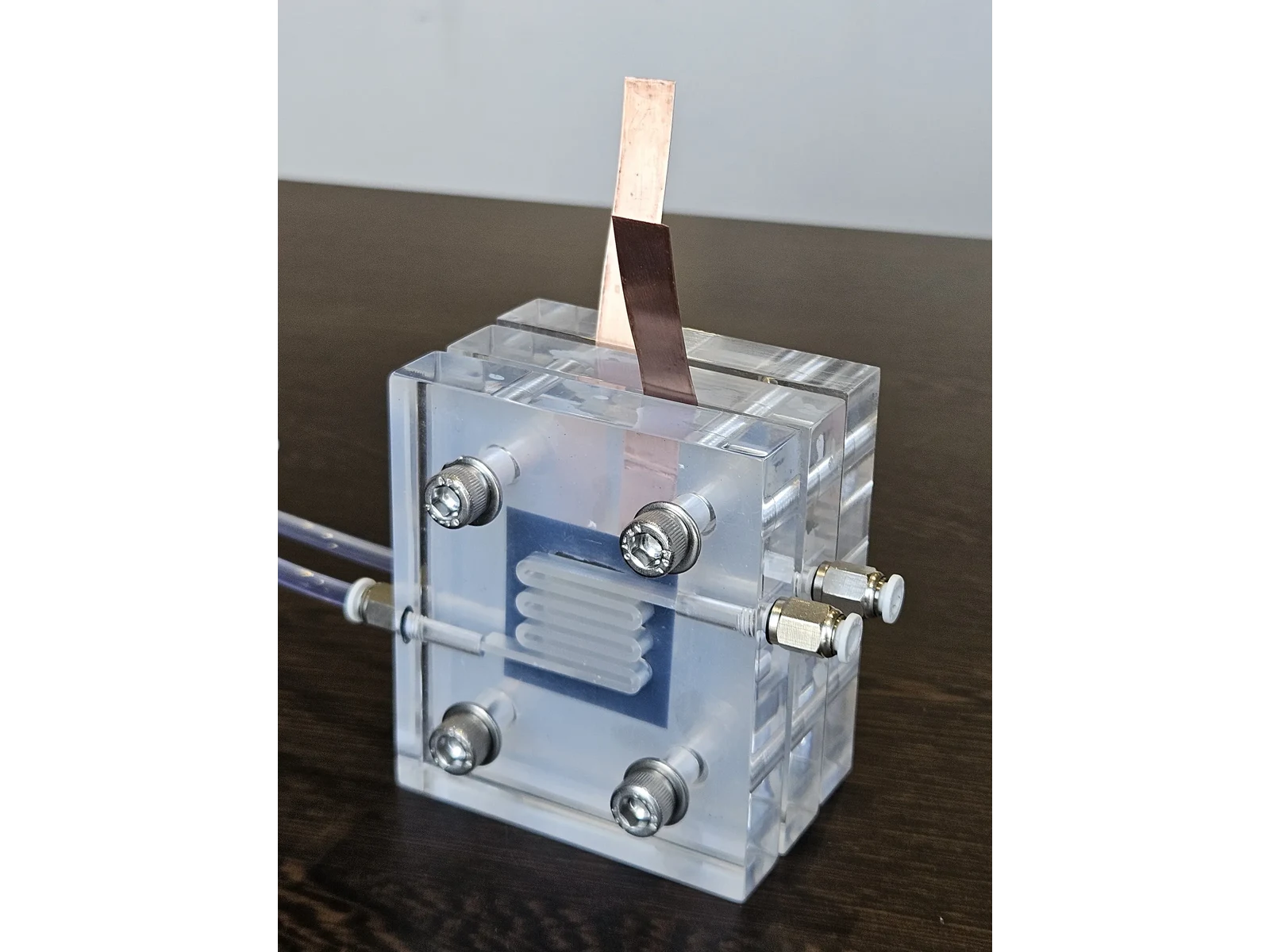 Vanadium Flow Cell Reactor - three-quarter view from the right showing the internal stack and the compression fittings